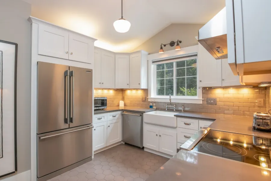 a modern kitchen with stainless steel appliances