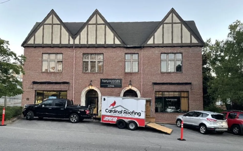 a truck parked in front of a building