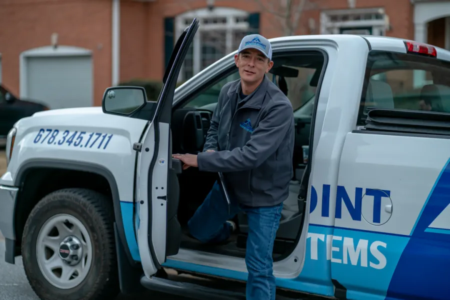 a Northpoint employee helping with roof insurance claim
