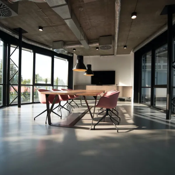 a room with a table and chairs