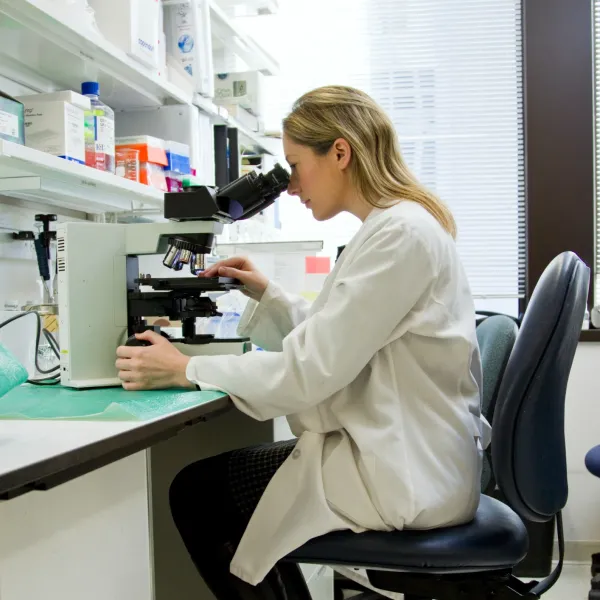 a person in a white coat