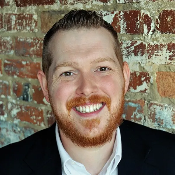 a man smiling for the camera