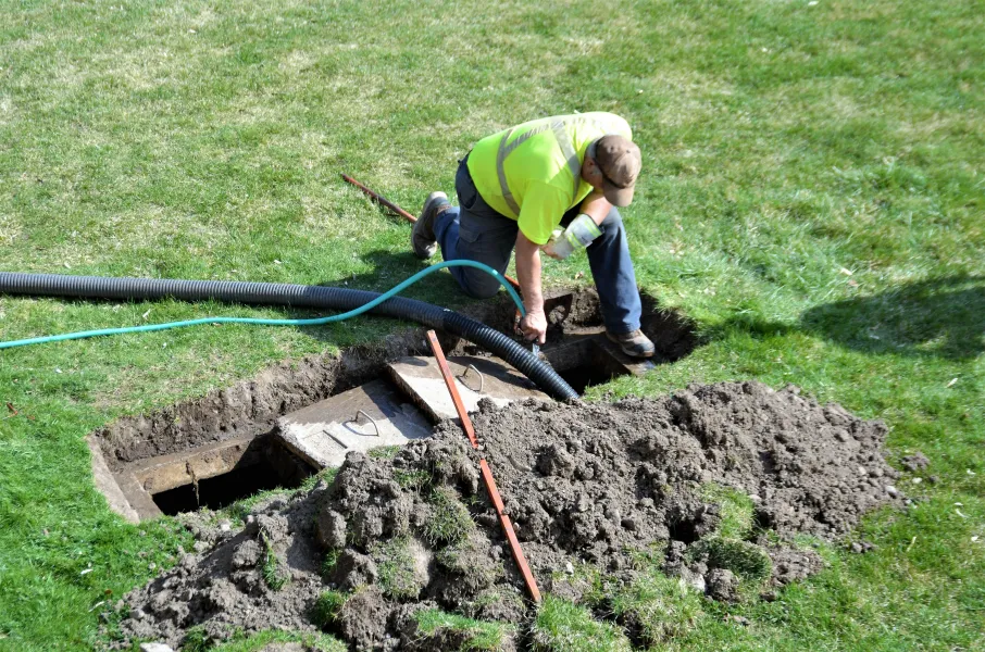 a man digging in the ground
