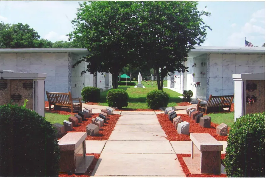 a garden in front of a building