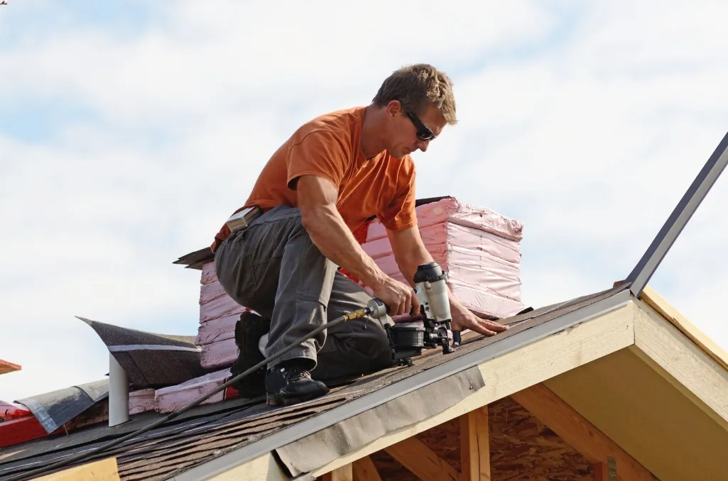 a man on a roof