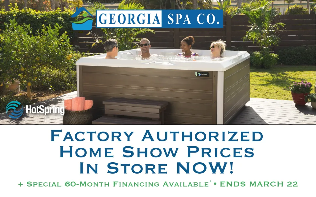 Four adults relaxing in an outdoor hot tub surrounded by plants and wooden deck with promotional text for Georgia Spa Co.