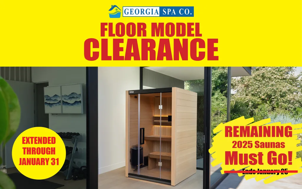 Modern wooden sauna with glass door in a bright room during Georgia Spa Co. floor model clearance sale
