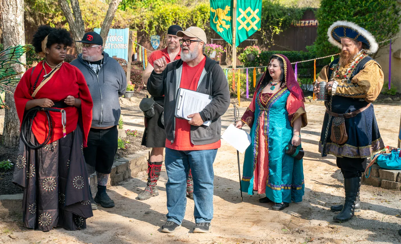 A festival crew at the Georgia Renaissance Festival, some in costume and some in street clothes