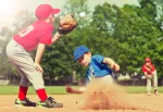 a couple of kids playing baseball