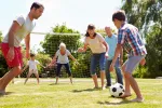 a group of people playing football