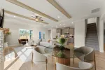 a large living room with a large staircase