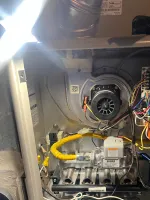 Atlanta HVAC Heat Furnace Repair 30338 Dunwoody by The Air Company of GA.  Furnace showing internal wiring, circuit board, blower motor, gas valve, and metal components in detail.