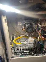 Atlanta HVAC Heat Furnace Repair 30338 Dunwoody by The Air Company of GA.  Open furnace showing internal wiring, circuit board, blower motor, and gas valve inside metal housing.