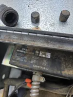 Wine Cellar Repair in Marietta 30064 by The Air Company of GA.  Close-up of a rusty metal hinge and control panel on a CellarCool refrigeration unit with visible model and serial numbers.