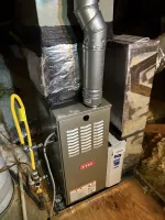 Residential AC New Unit Installation in Brookhaven Atlanta 30319 by The Air Company of GA.  Bryant furnace unit installed in basement with ductwork, gas line, and humidifier in view.