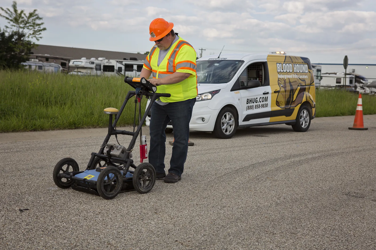 Man from Blood Hound Underground Utility Locators performing ground penetrating radar