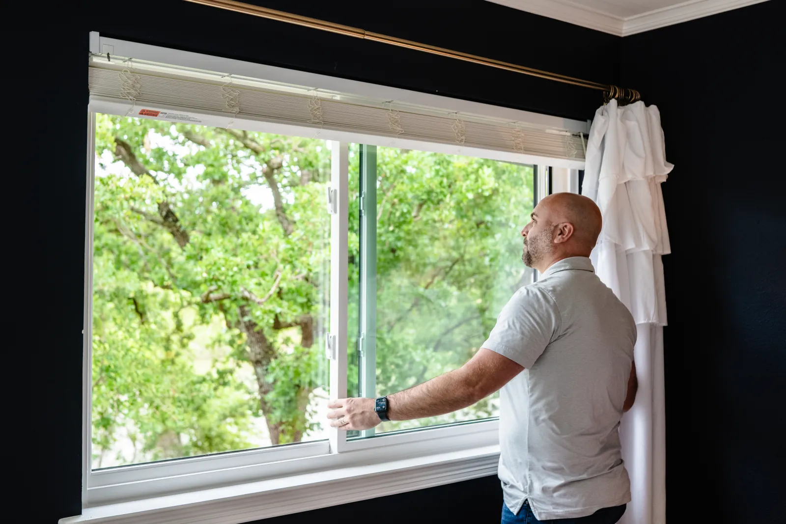 Man opening long-lasting/durable window