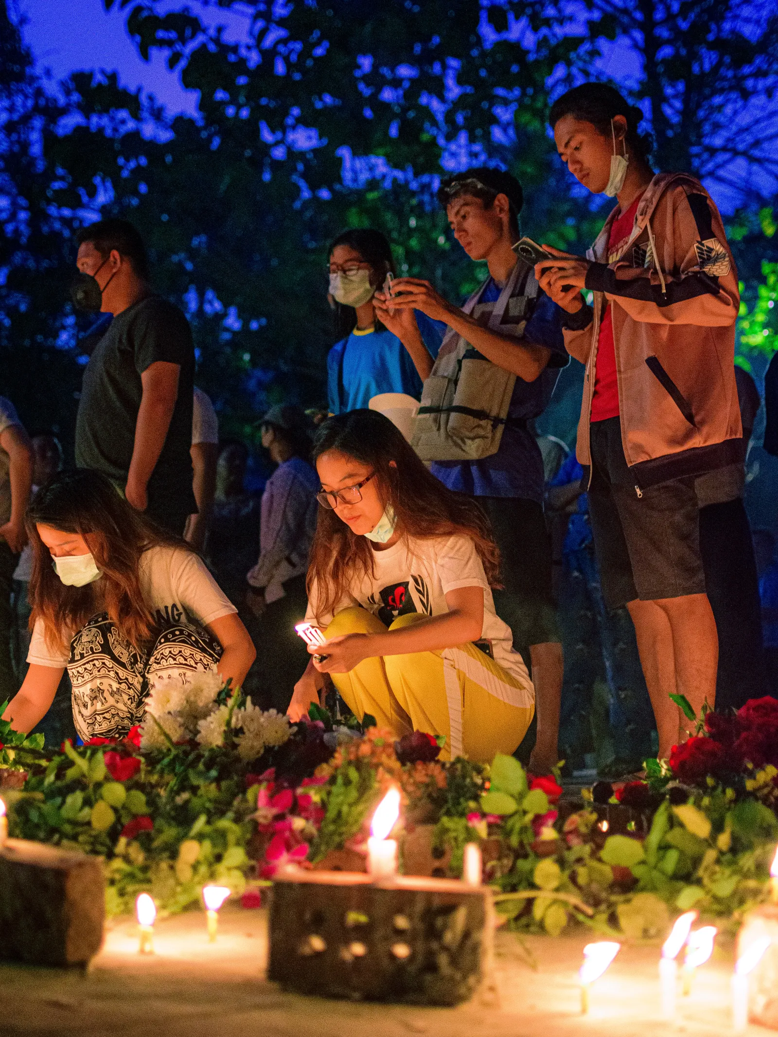 Candles lit at outside memorial