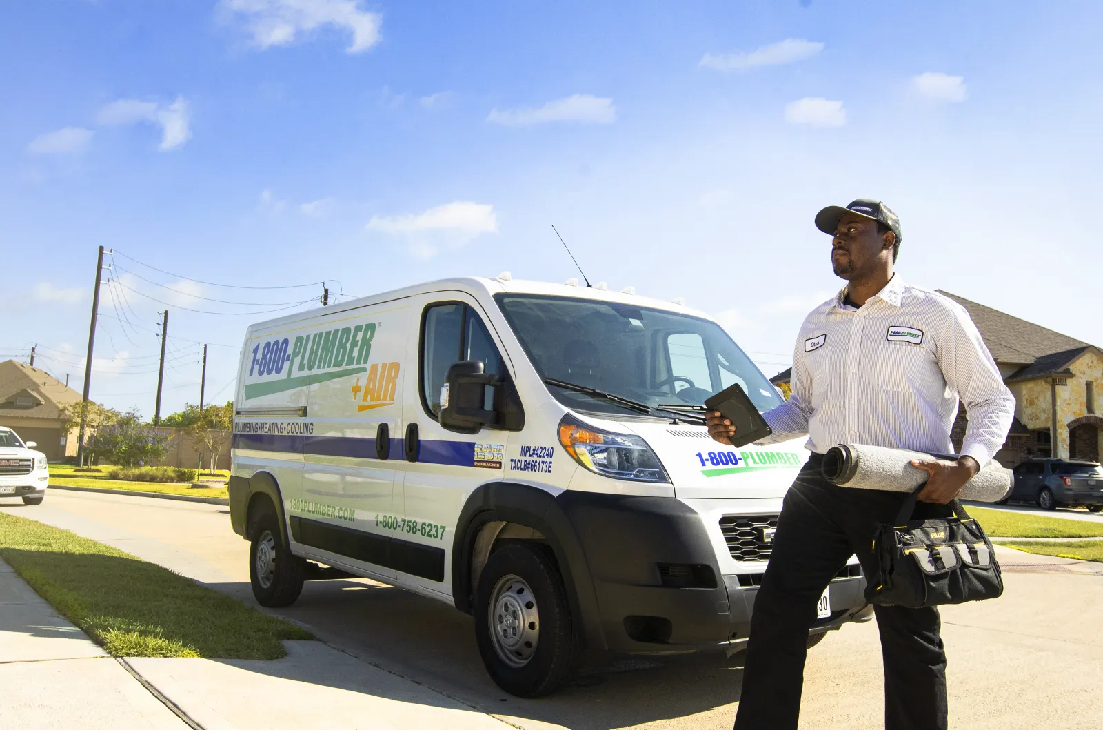 Technician walking up to customer's home