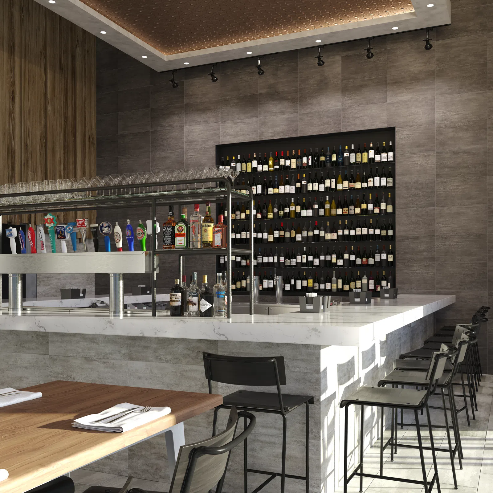 Modern bar interior with marble countertop, multiple liquor bottles, beer taps, and black bar stools along the counter.