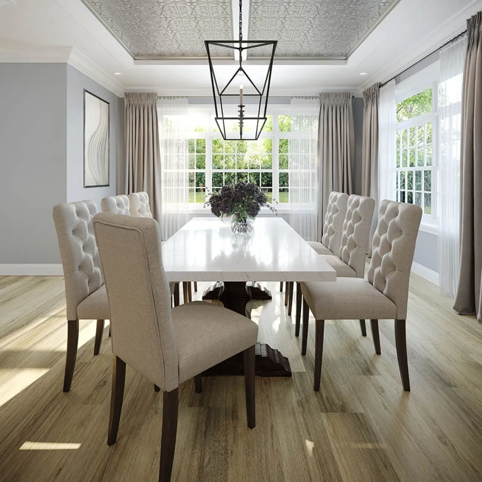 Bright dining room with large windows, beige tufted chairs, wooden floor, white table, and modern chandelier.