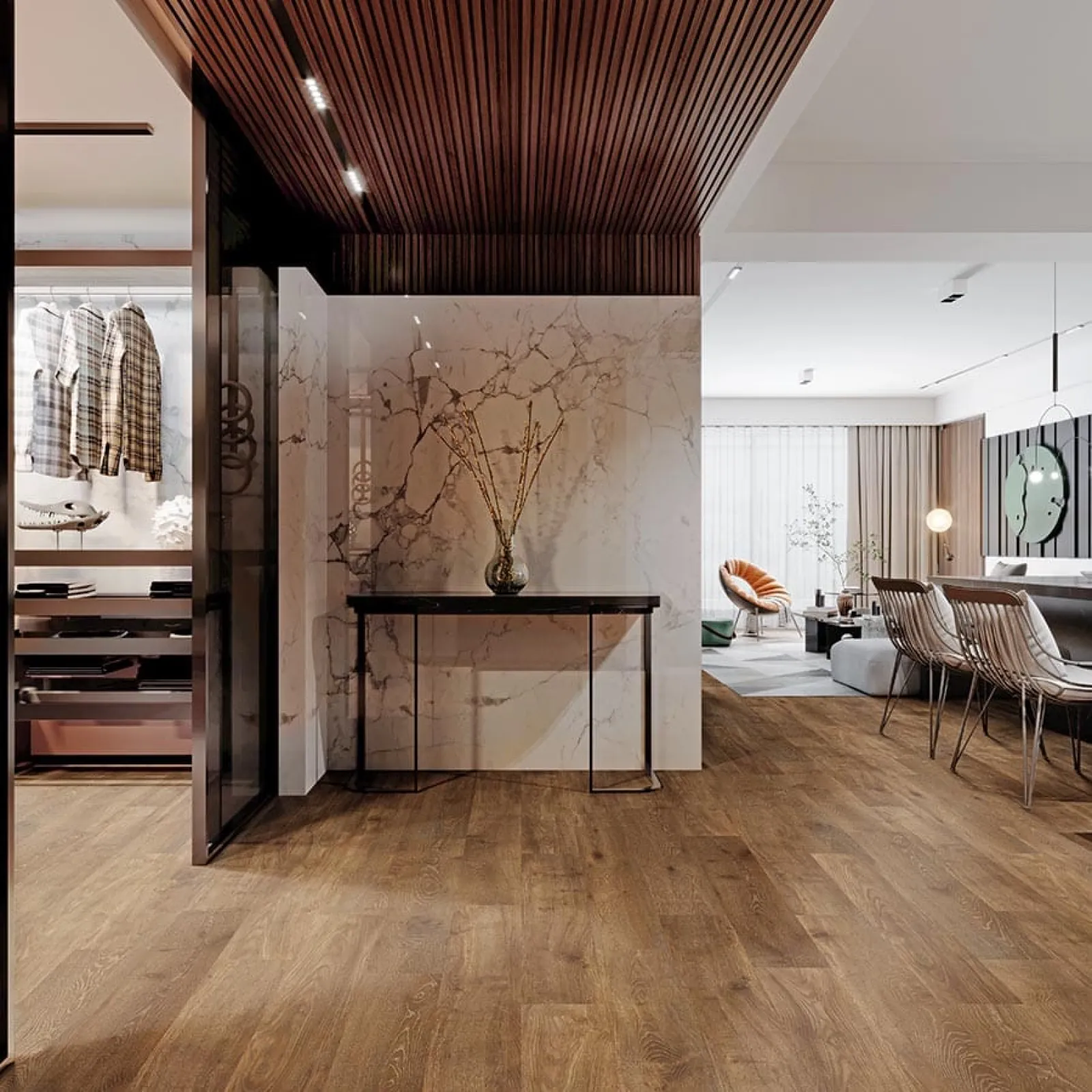 Modern open-plan living space with wooden floors, marble wall, stylish furniture, and walk-in closet.