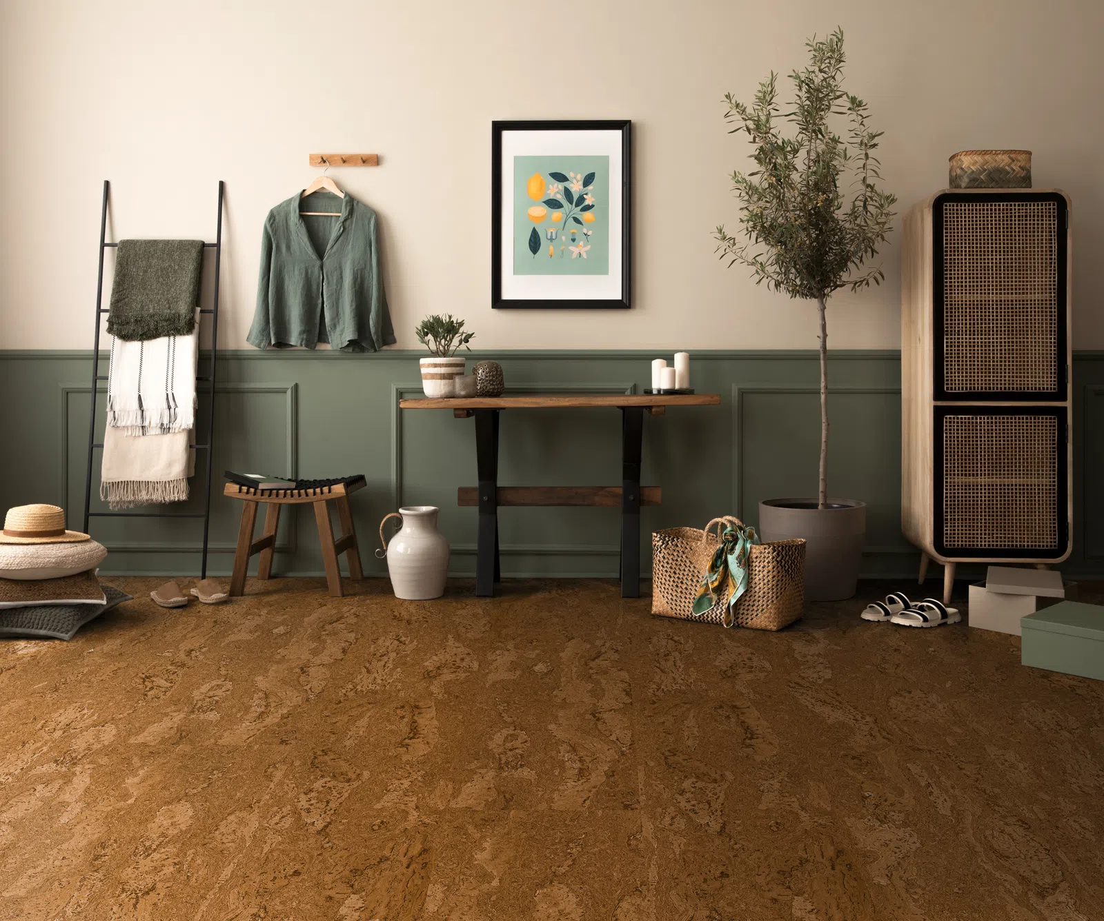 Cozy room with cork flooring, green paneled wall, rustic bench, potted plant, and woven basket with decor.