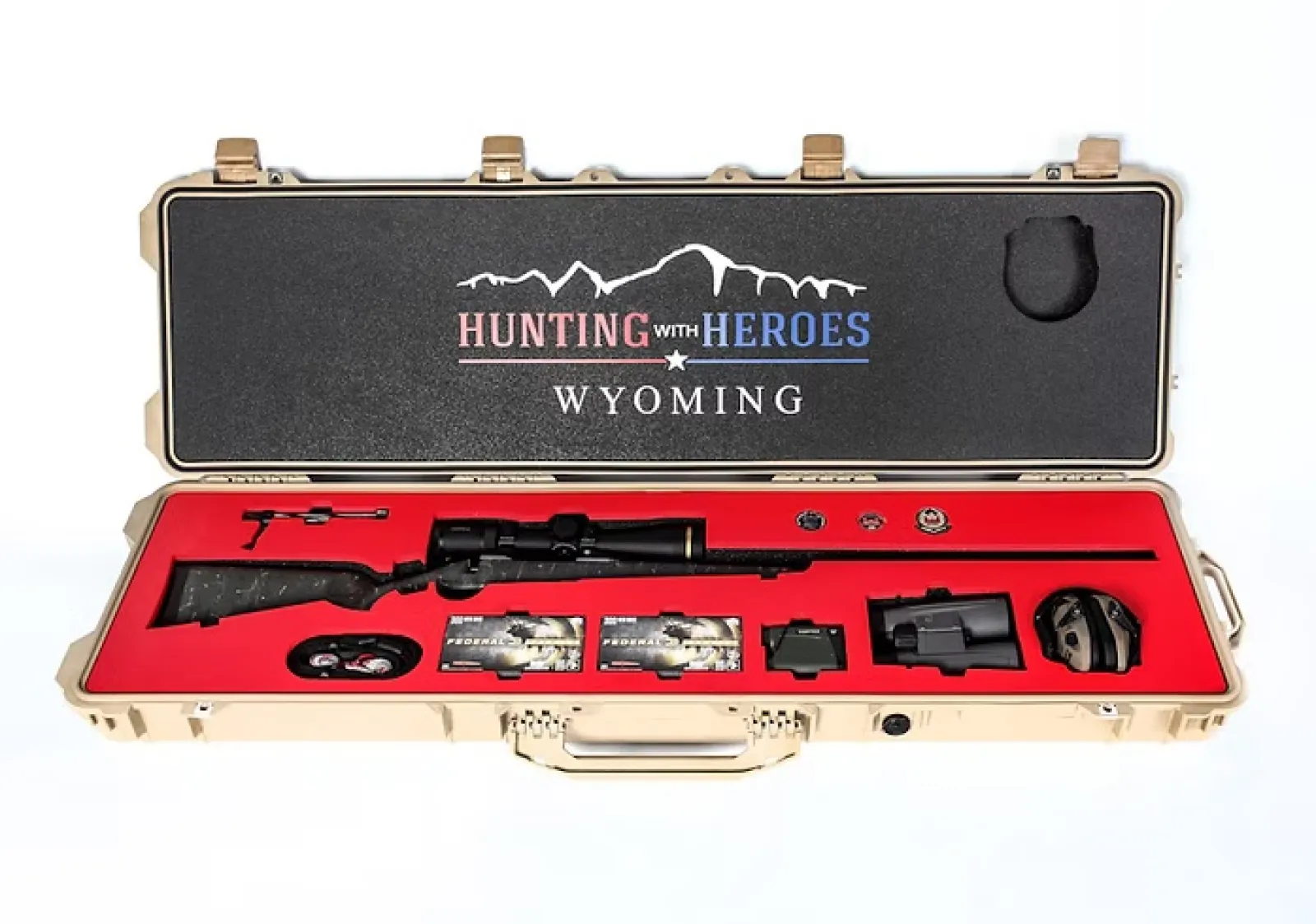 Rifle in custom case with red lining and Hunting with Heroes Wyoming logo on lid interior.