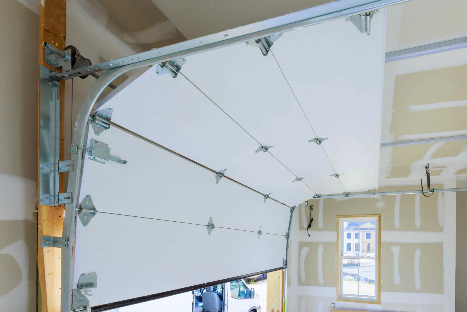 Book a Weatherproofing Service to Protect Your Garage Before Summer Storms