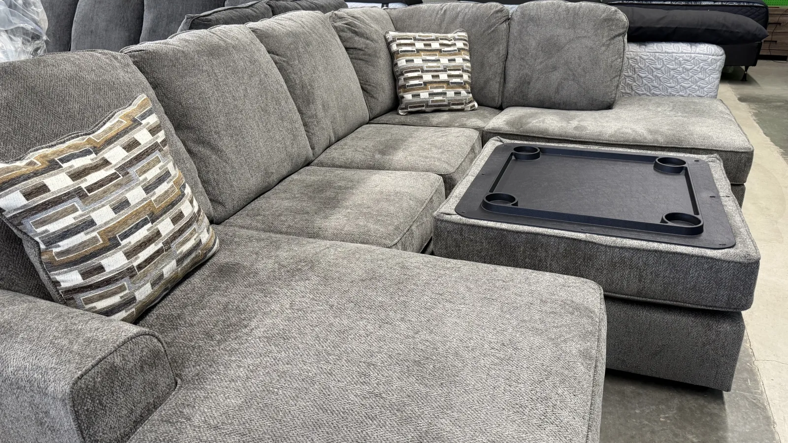 a couch with a laptop on it