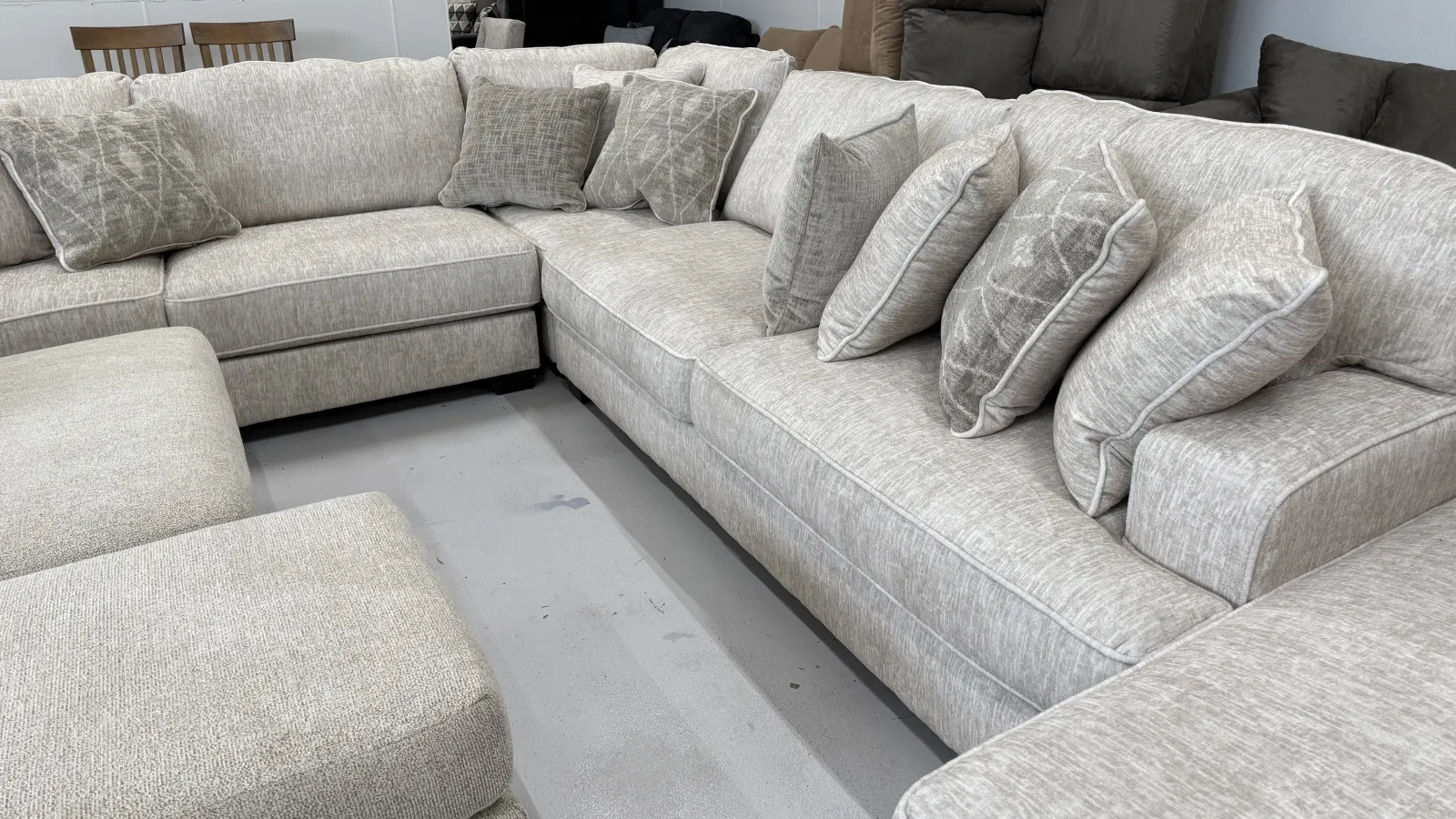 a couch with white cushions