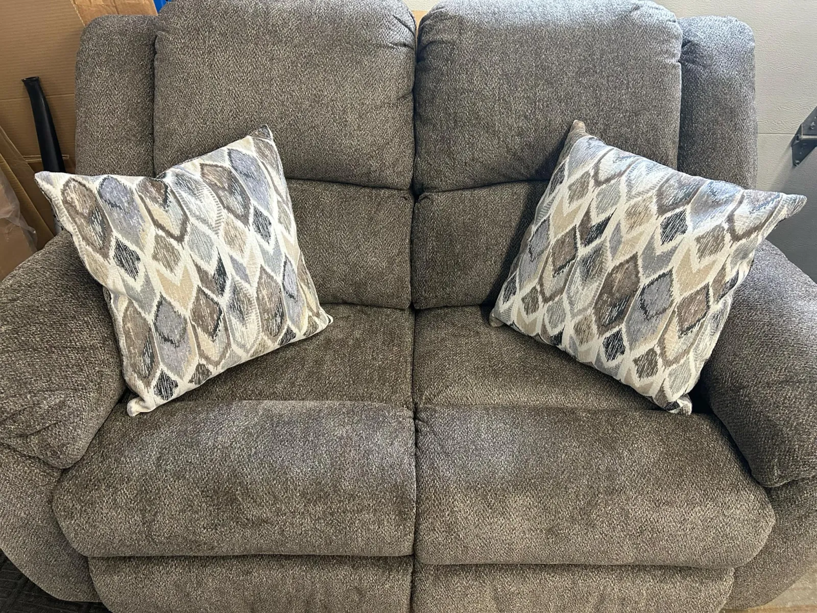 a couch with a couple of pillows