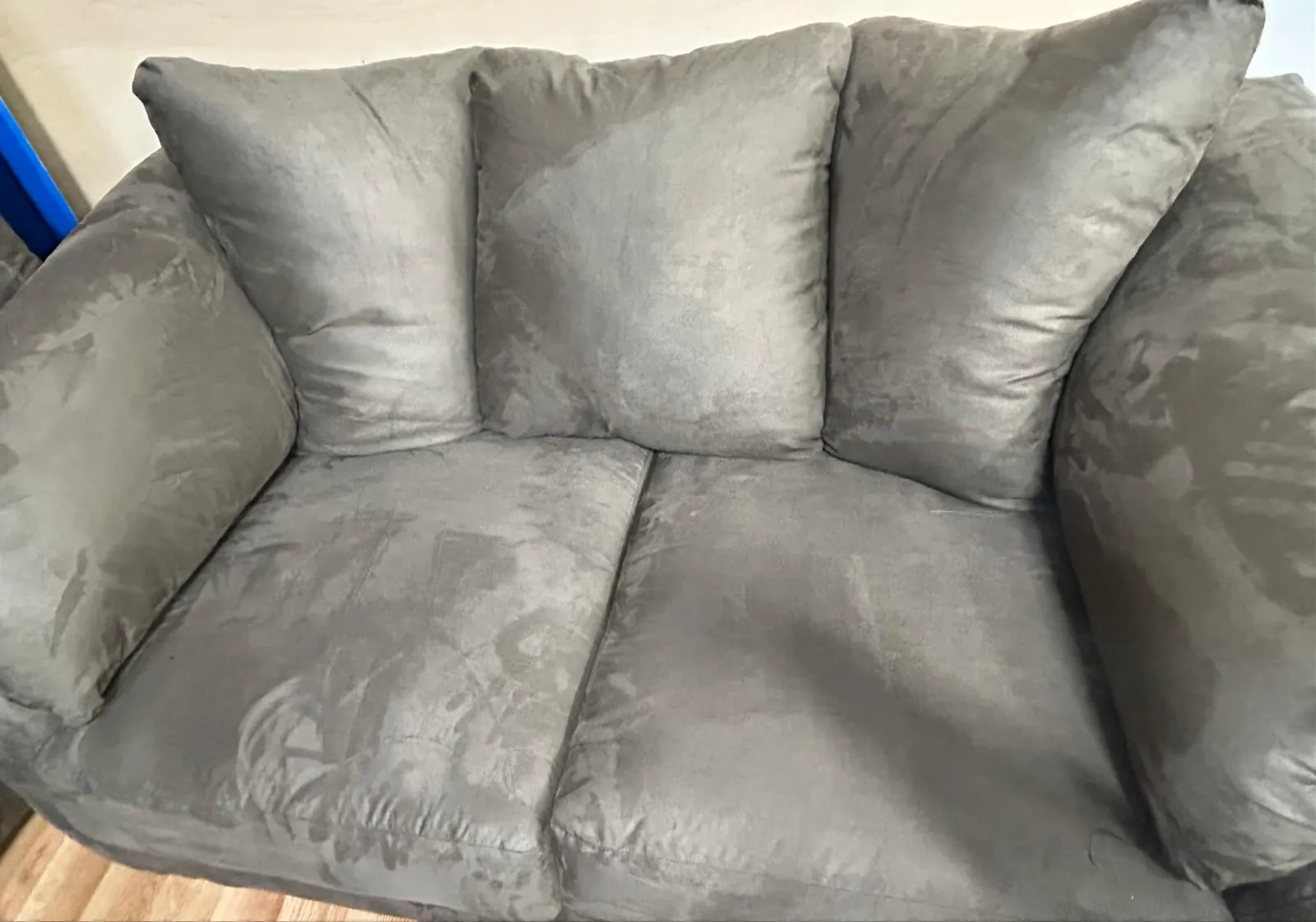 a couch with many pillows