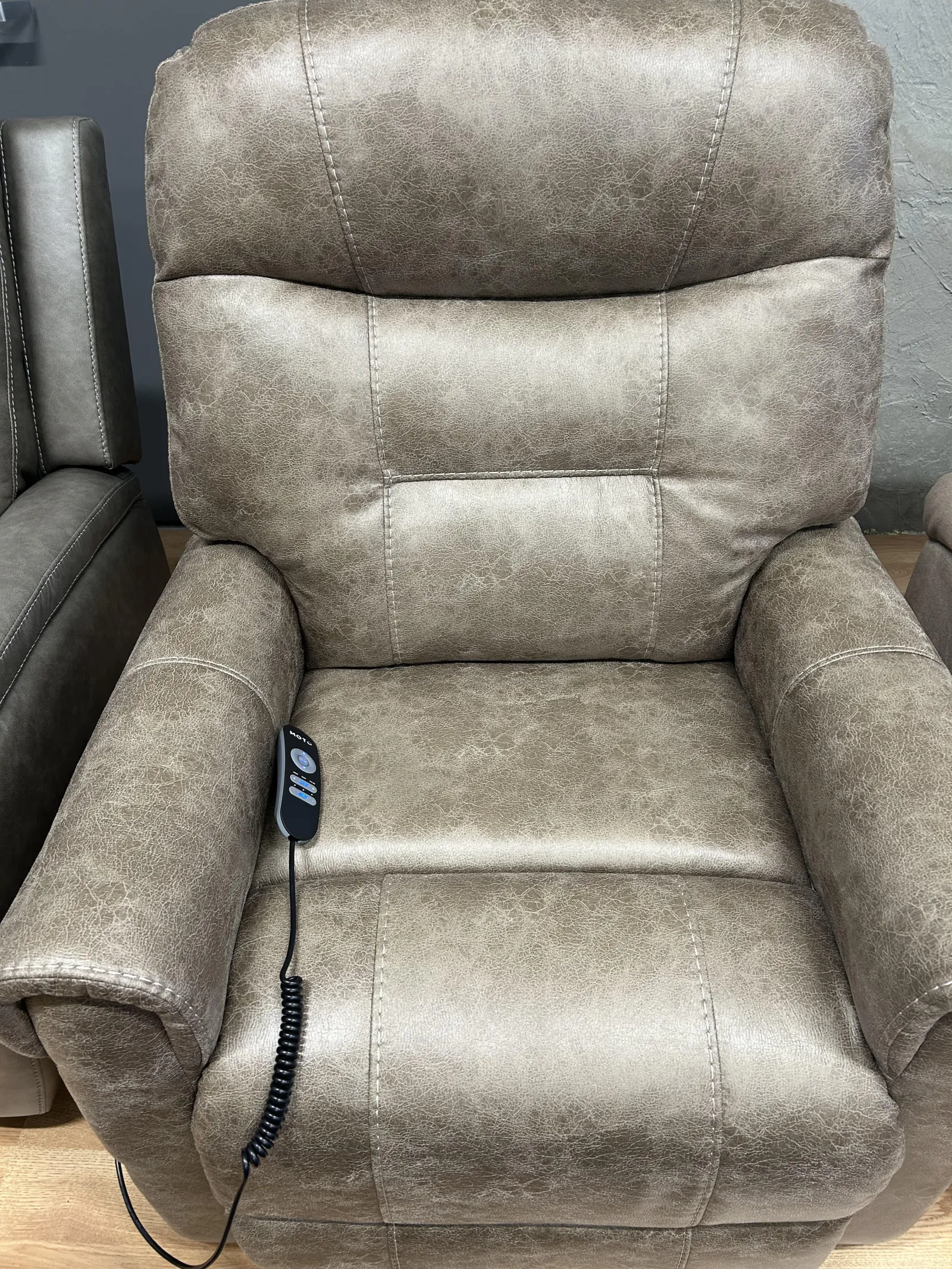 a grey leather chair