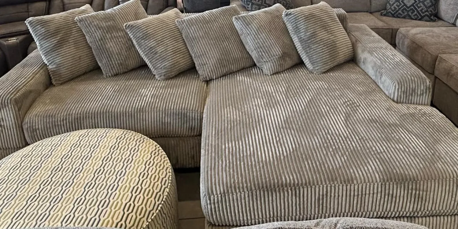 a couch with many pillows