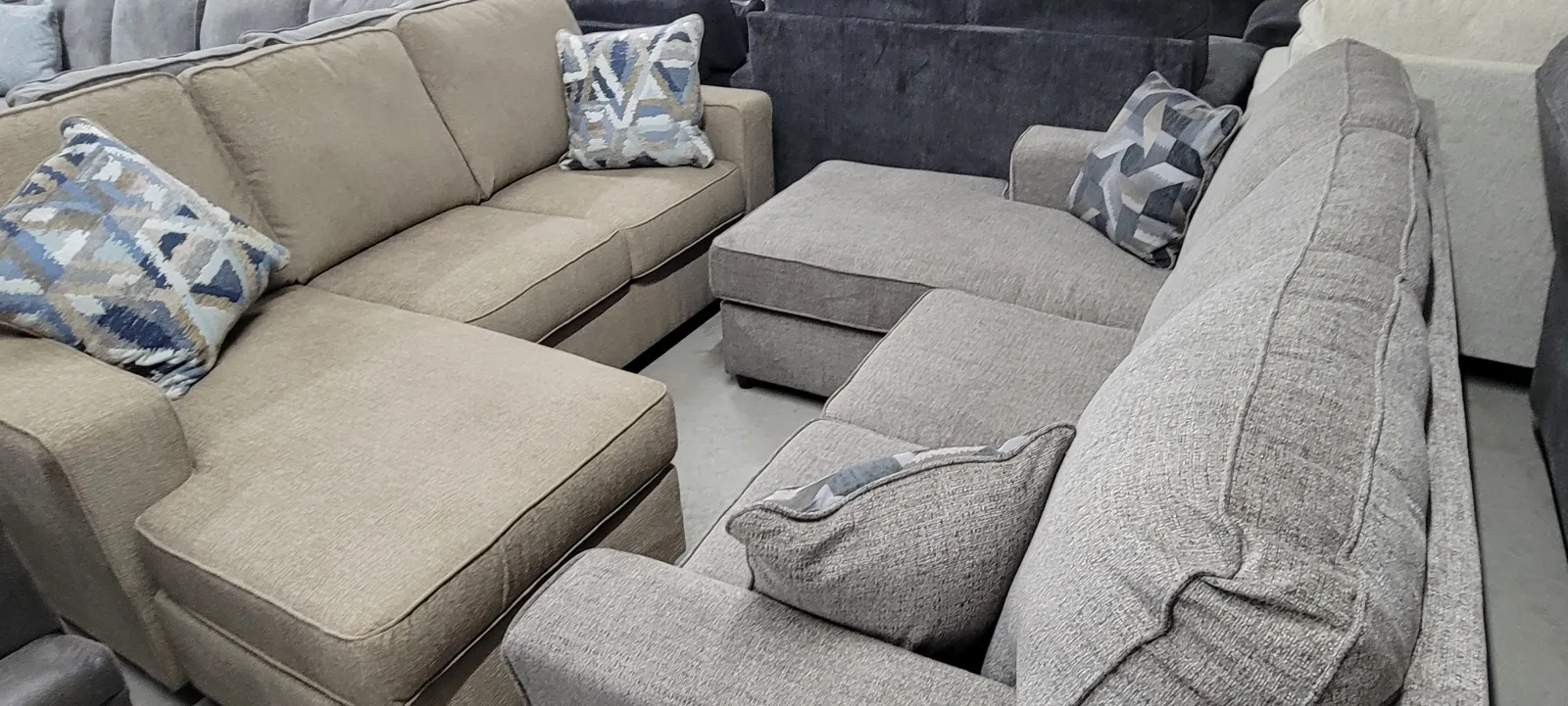 a couch with a grey cushion