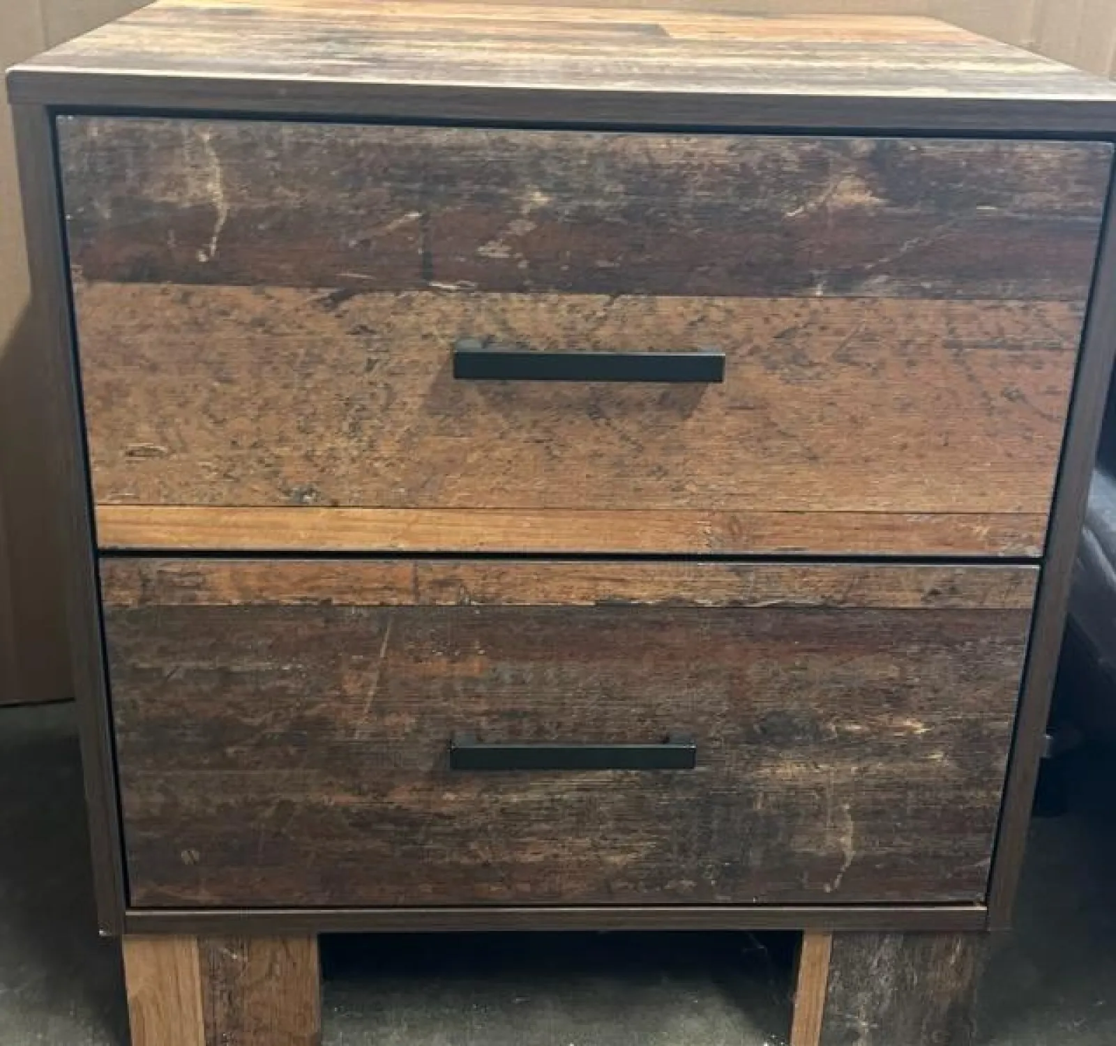 a wooden chest with a handle