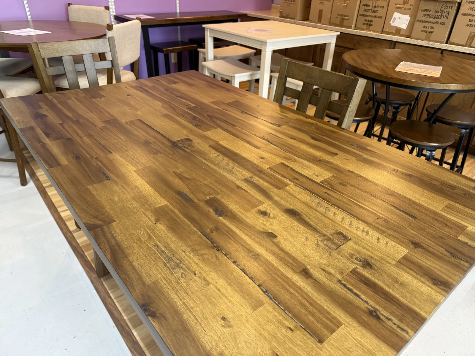 a wooden table in a classroom