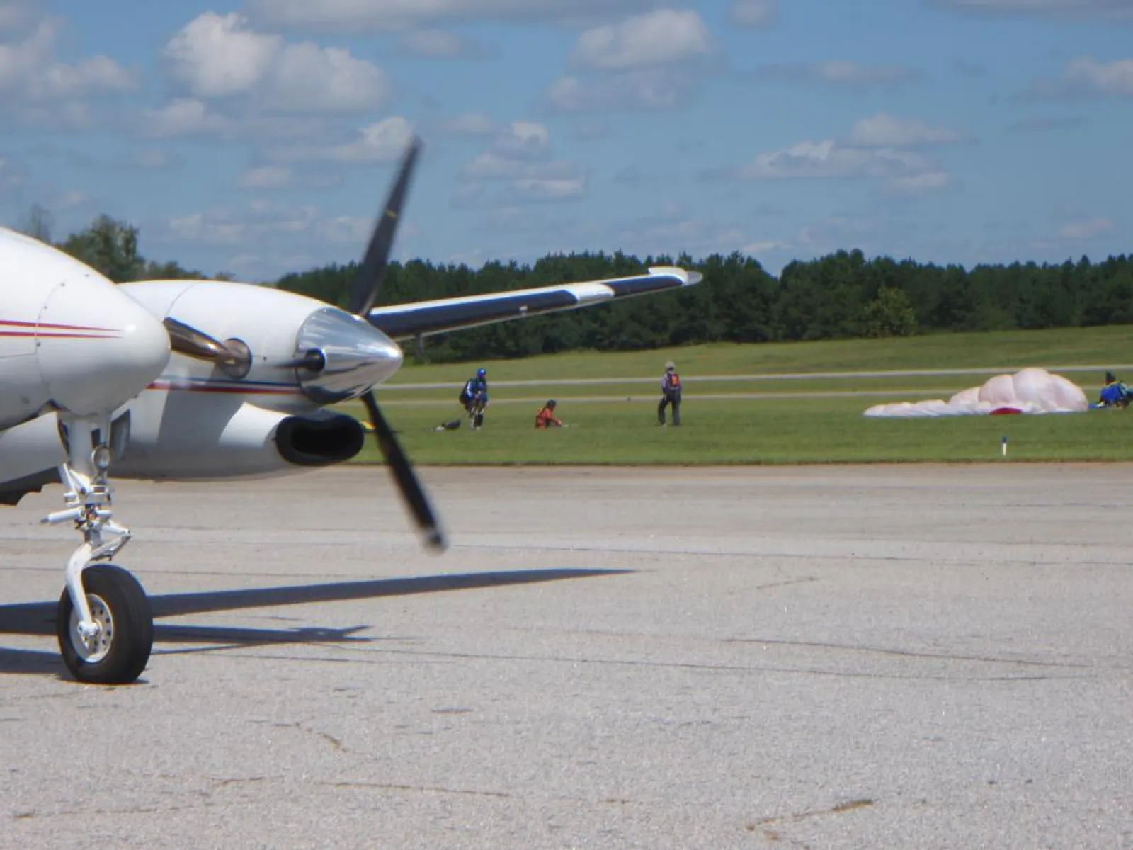 a small airplane sitting on top of a runway