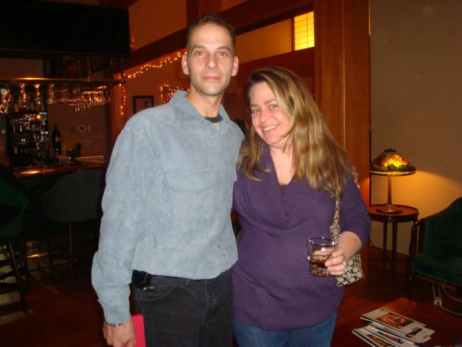 a man and a woman standing in a room