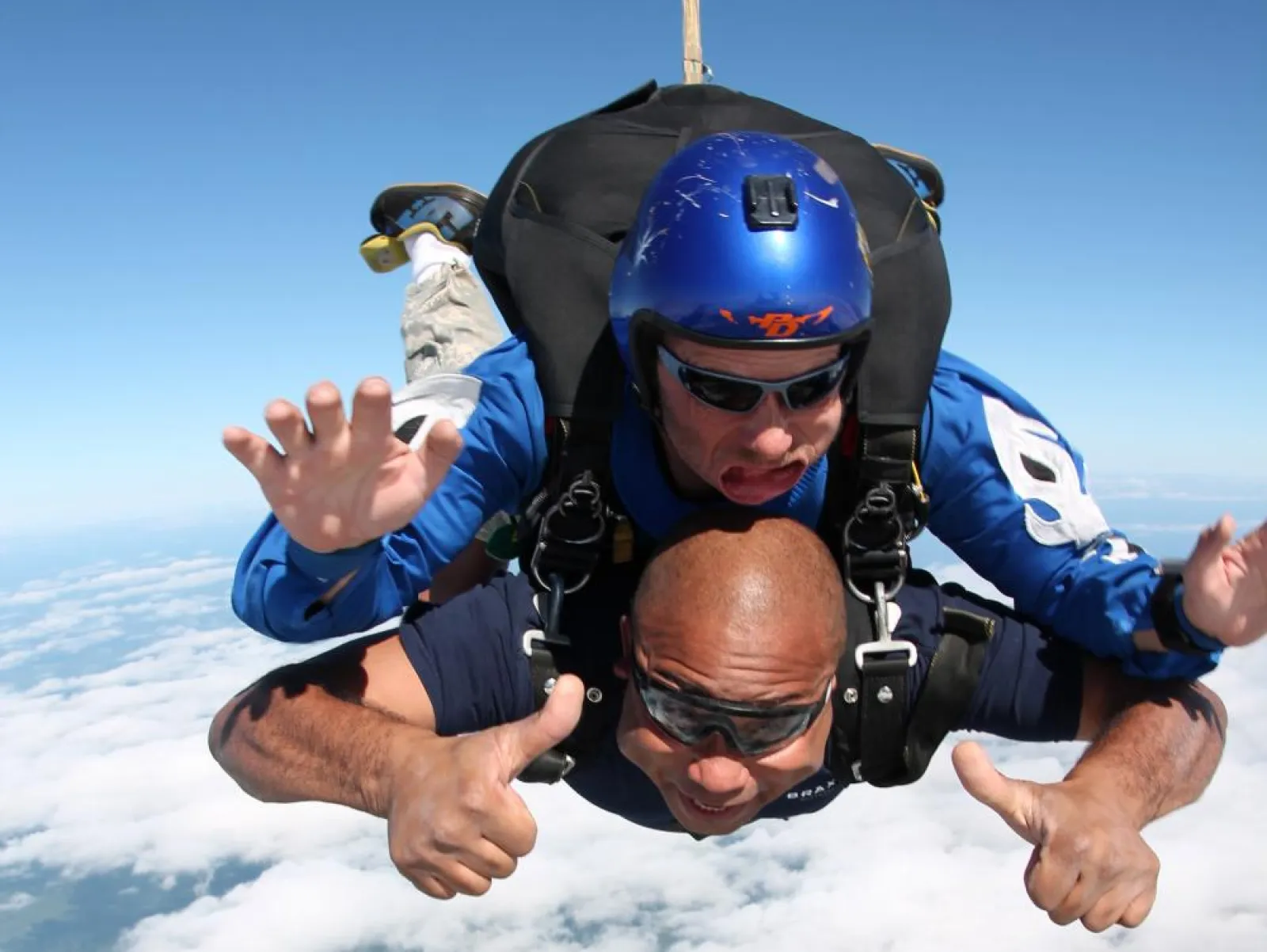 two people sky diving