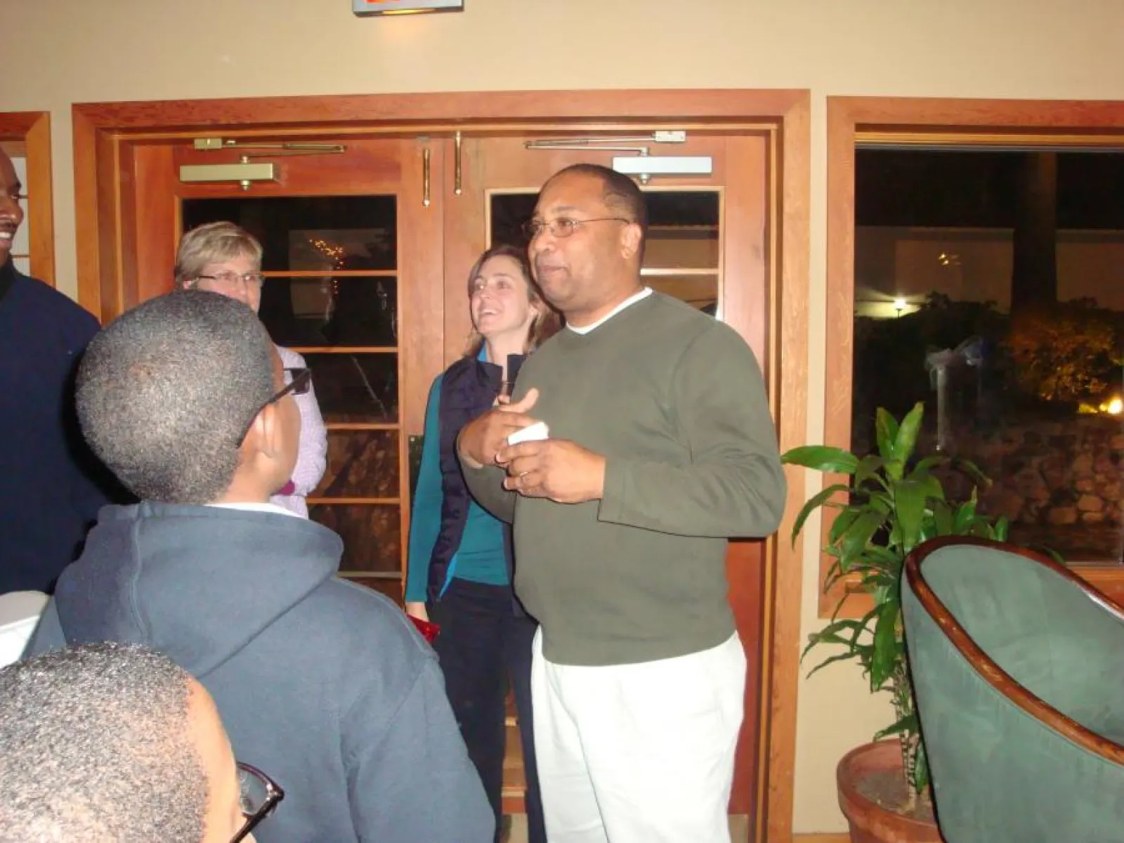 a group of people standing in a room