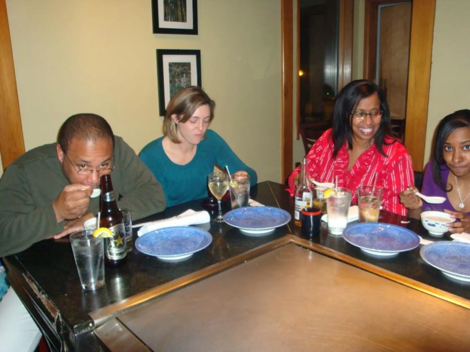 a group of people sitting at a table