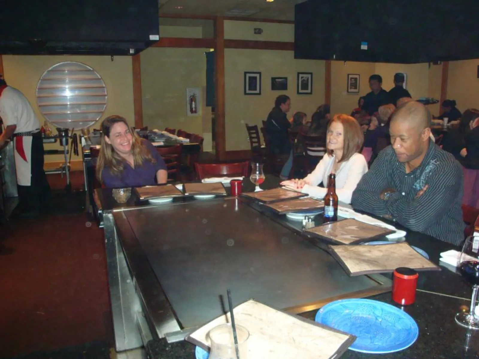 a group of people sitting at a table