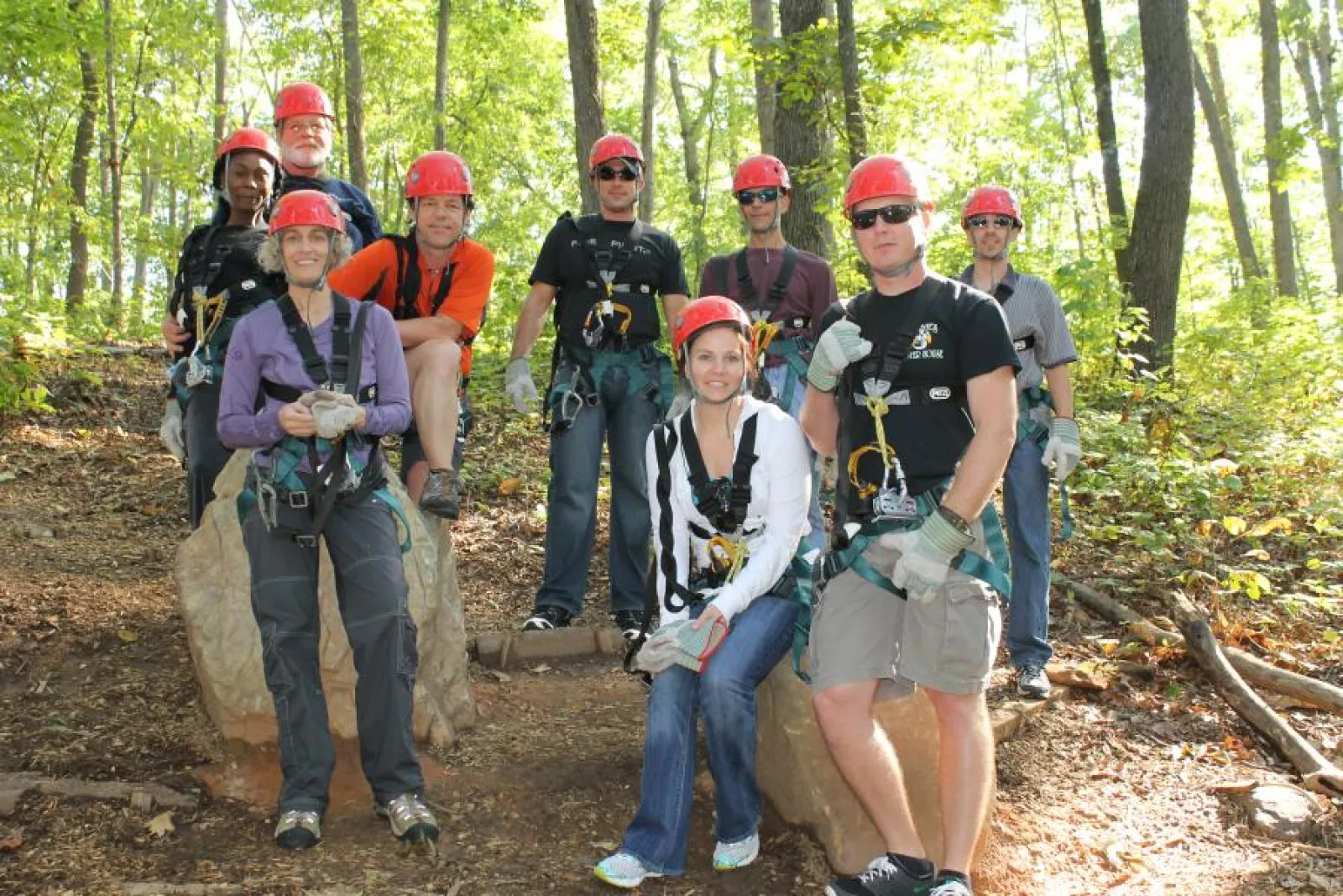 a group of people in a forest