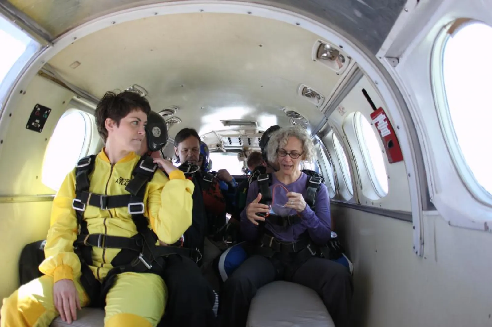 a group of people sitting in a plane