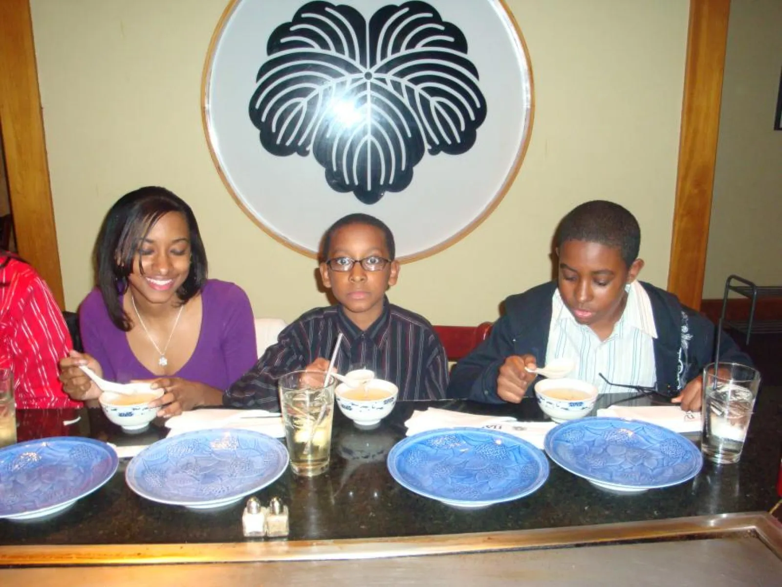 a group of people sitting at a table