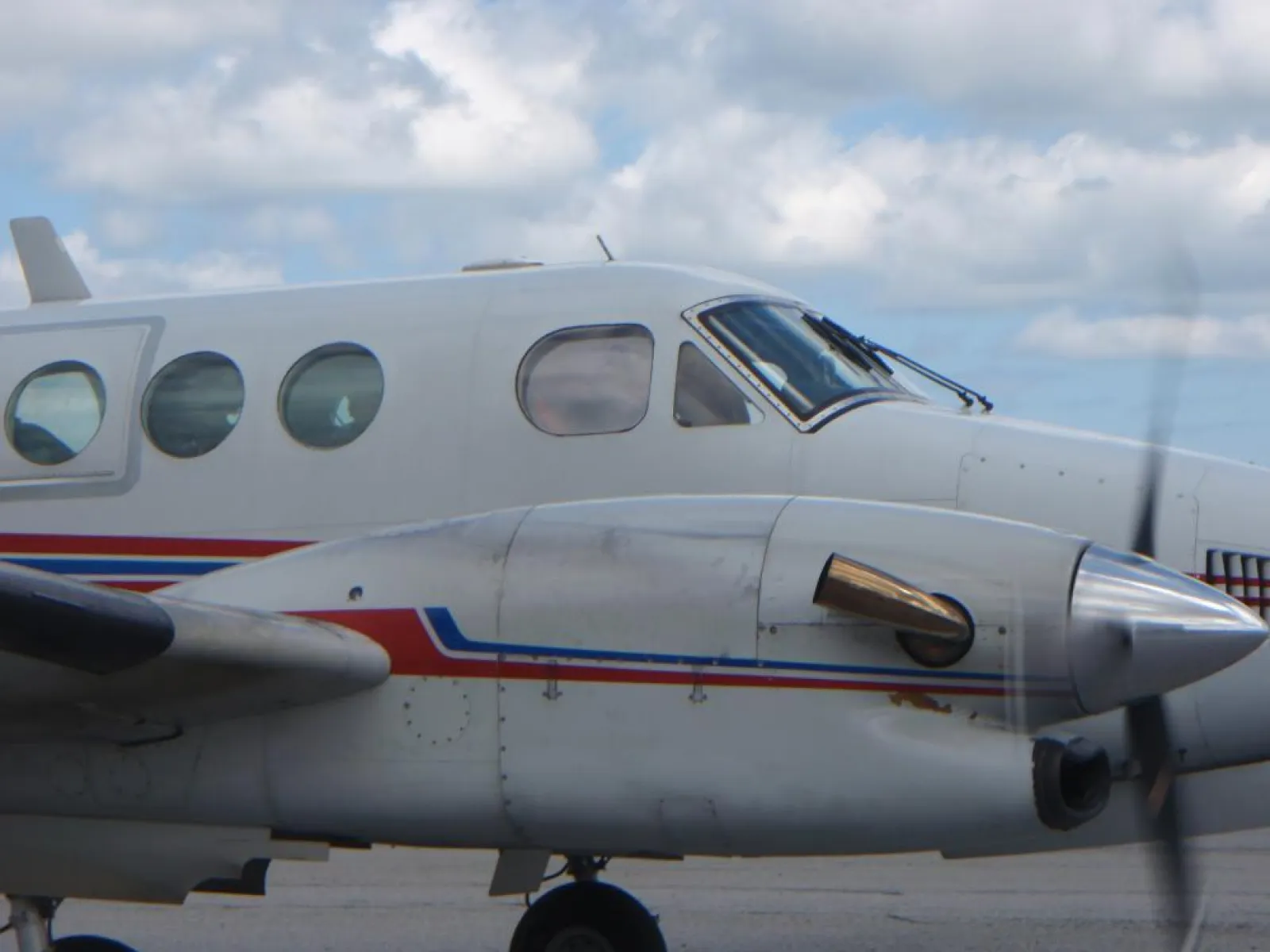 a passenger jet sitting on top of a runway