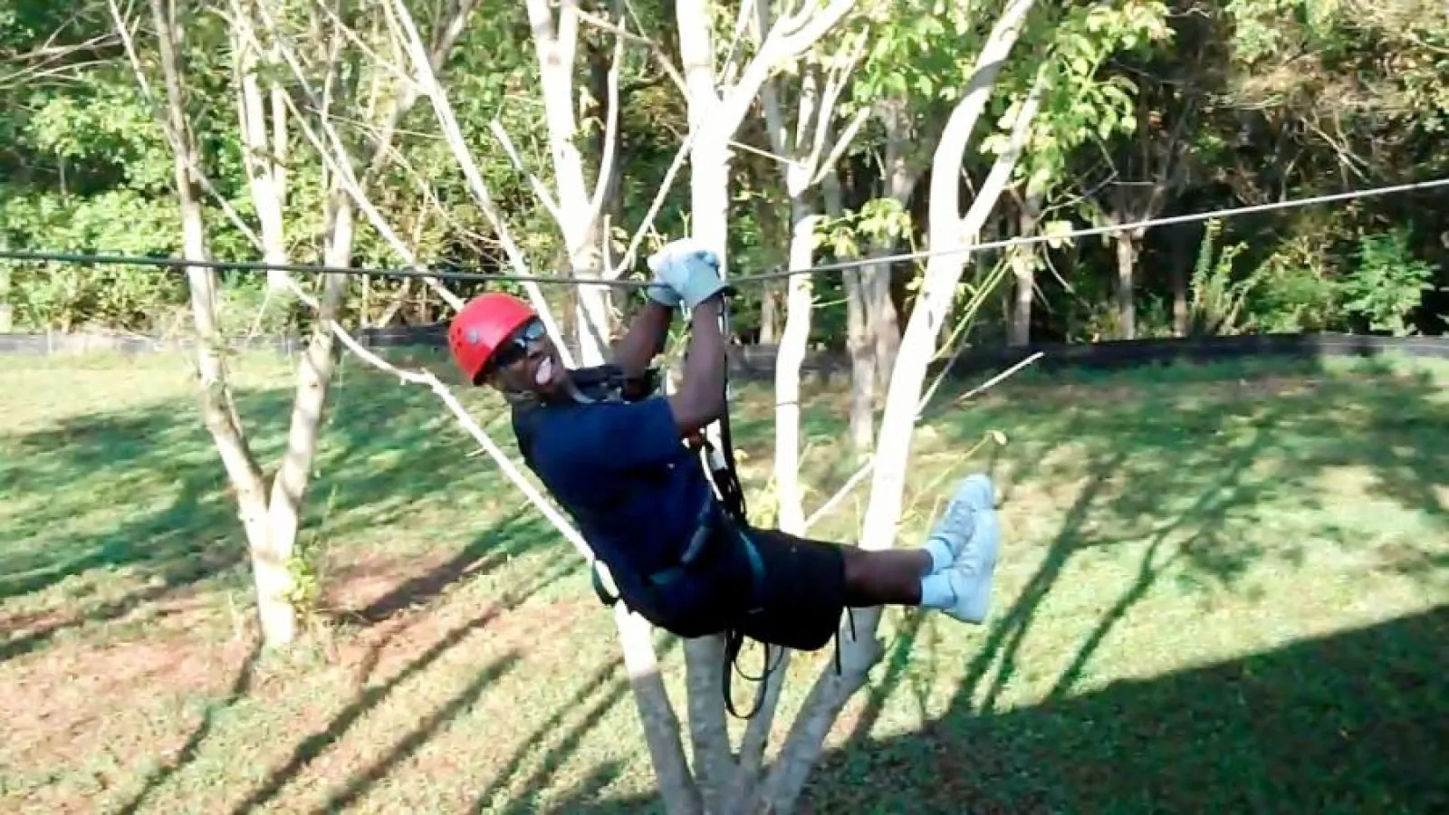 a man on a zip-line