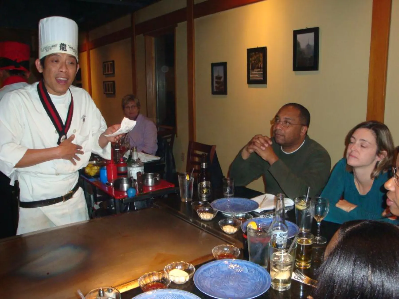 a group of people sitting at a table